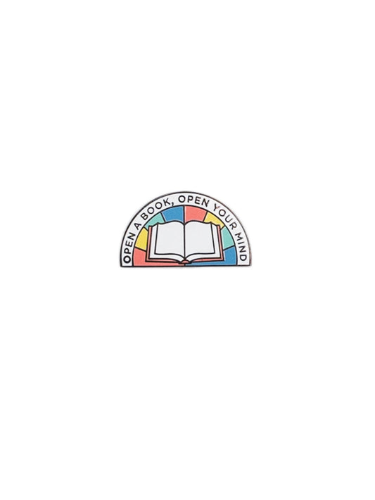 A hemisphere-shaped rainbow-colored pin. In the center is an open book. The words "Open a book, open your mind" frames the outside.