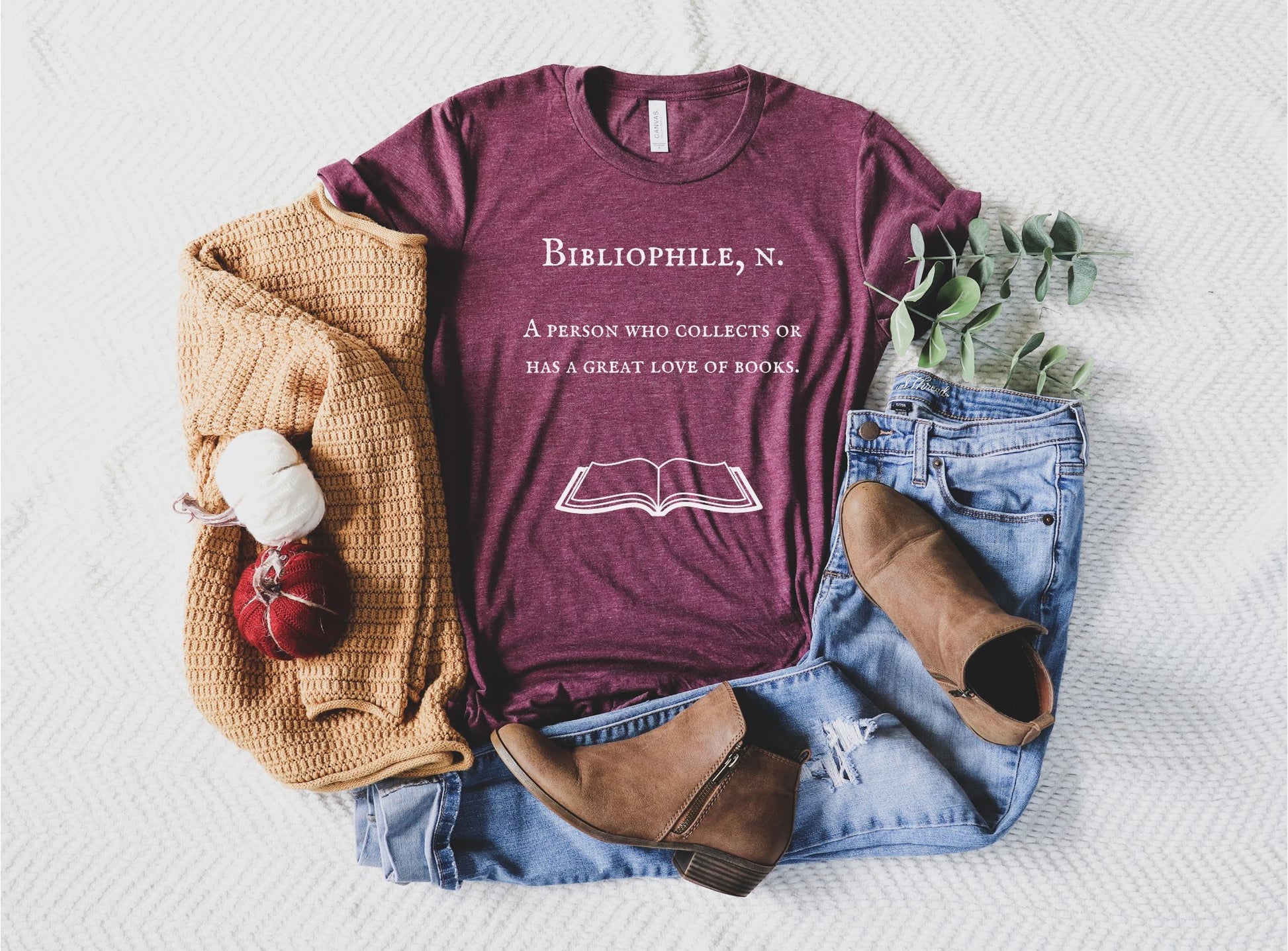 Maroon t-shirt with a bibliophile definition on it.