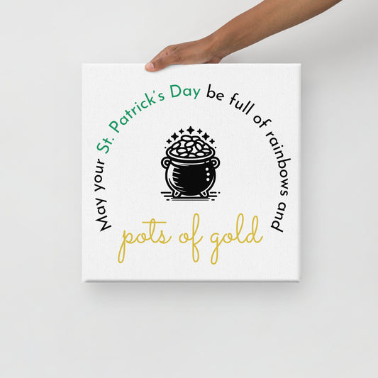 Canvas print with black, green, and gold text and a black pot of gold.