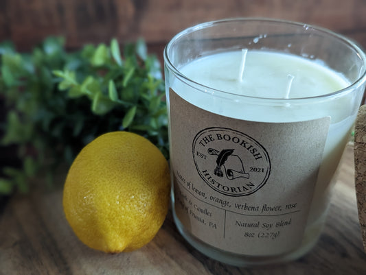 Lemon verbena candle with the TBH logo.