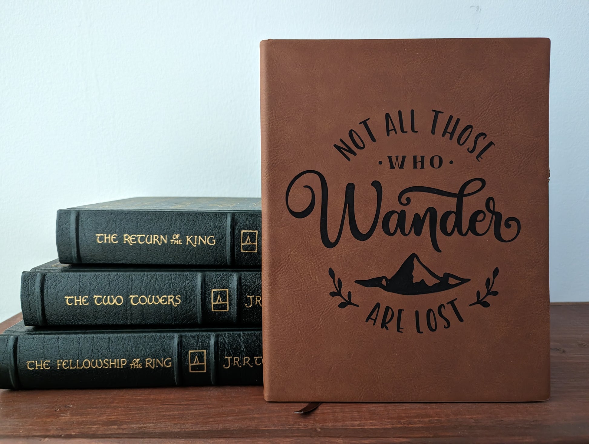 Leather vegan journal engraved with the Tolkien quote "Now all those who wander are lost."