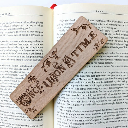 A wooden bookmark that says "once upon a time."
