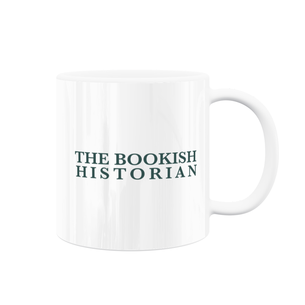 A white mug with the teal "The Bookish Historian" wordmark on it.