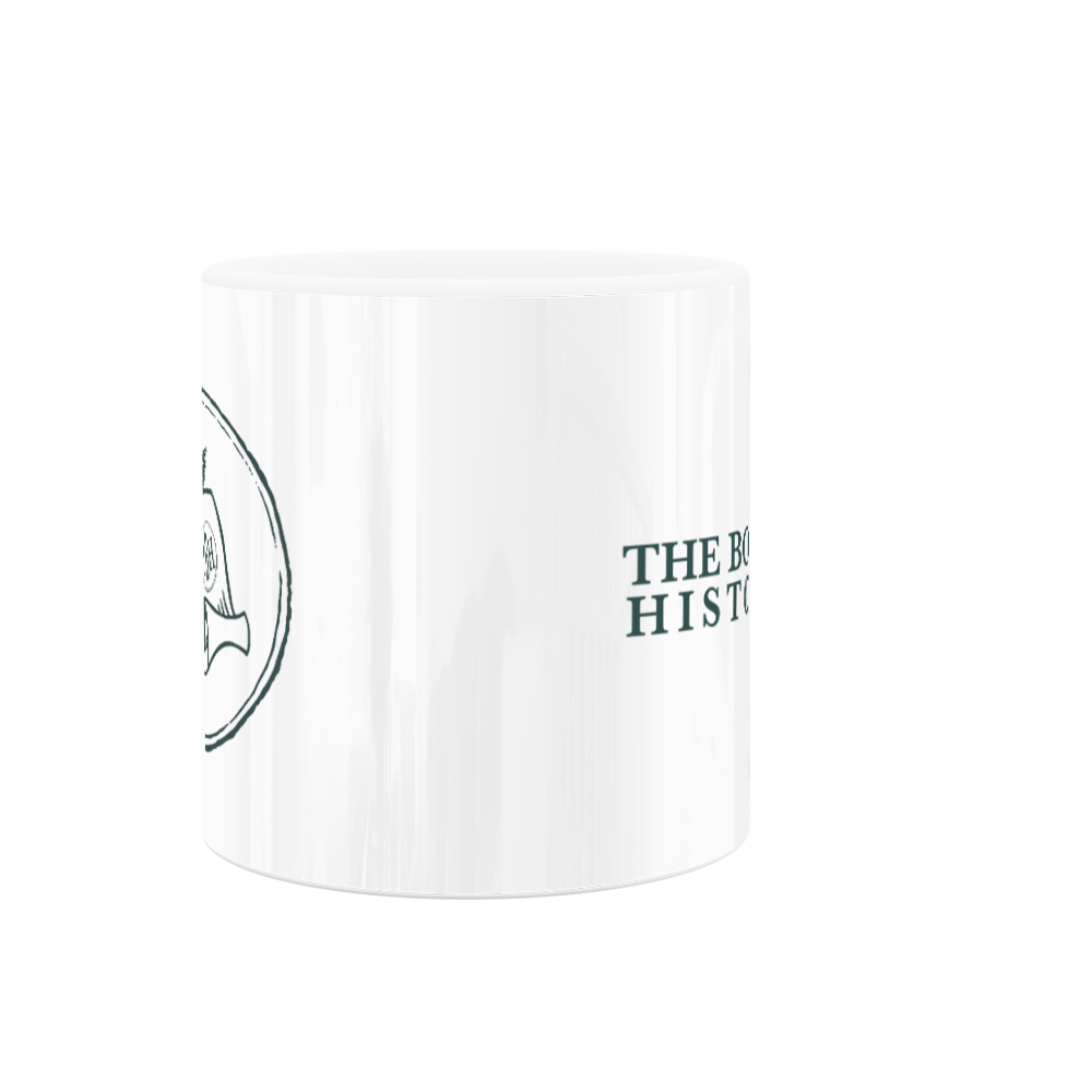 A white mug with The Bookish Historian designs on it.
