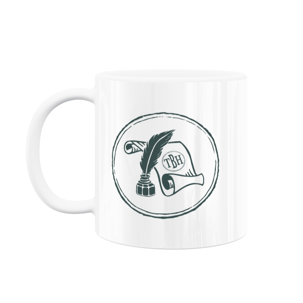 A white mug with the teal "The Bookish Historian" scroll-and-quill logo on it.